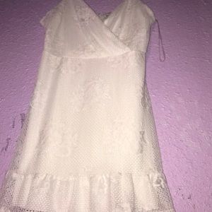 Woman’s large white lace sundress